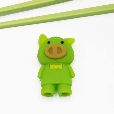 Utensílios de mesa de silicone em forma de porco Suportes de pauzinhos cabeça para crianças