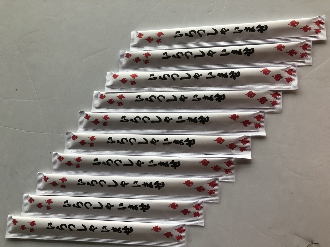Hashis de bambu de Dispossable dos GÊMEOS de 24CM com o papel completo envolvido para o alimento chinês