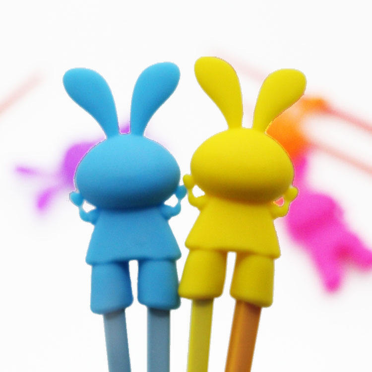 Cabeça de pauzinho auxiliar de silicone em forma de coelho de desenho animado para treinamento infantil