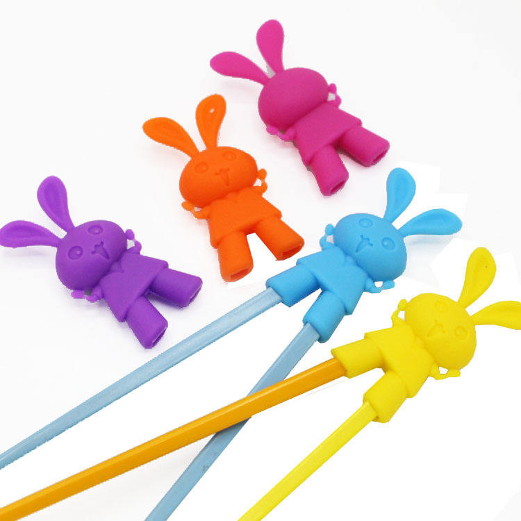 Cabeça de pauzinho auxiliar de silicone em forma de coelho de desenho animado para treinamento infantil