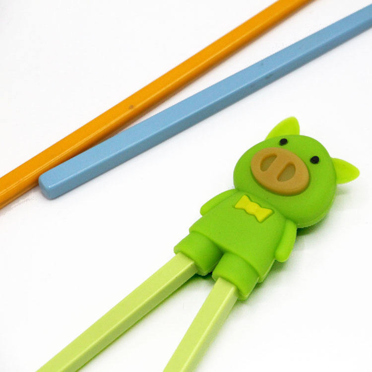 Utensílios de mesa de silicone em forma de porco Suportes de pauzinhos cabeça para crianças