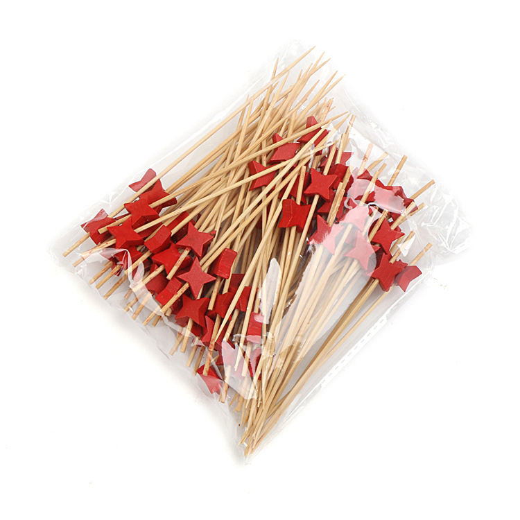 Os espetos de bambu longos dos acessórios do assado colam os palitos de bambu do aperitivo das varas