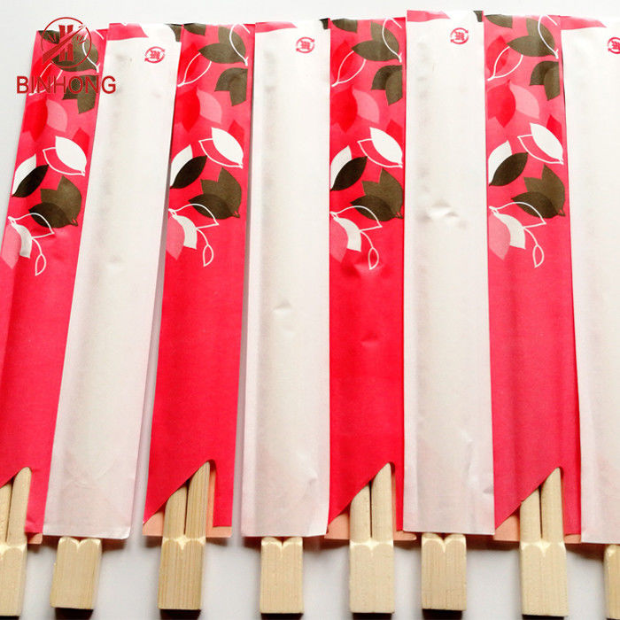 Hashis de bambu chineses de Tensoge para o restaurante, meio envoltório do papel