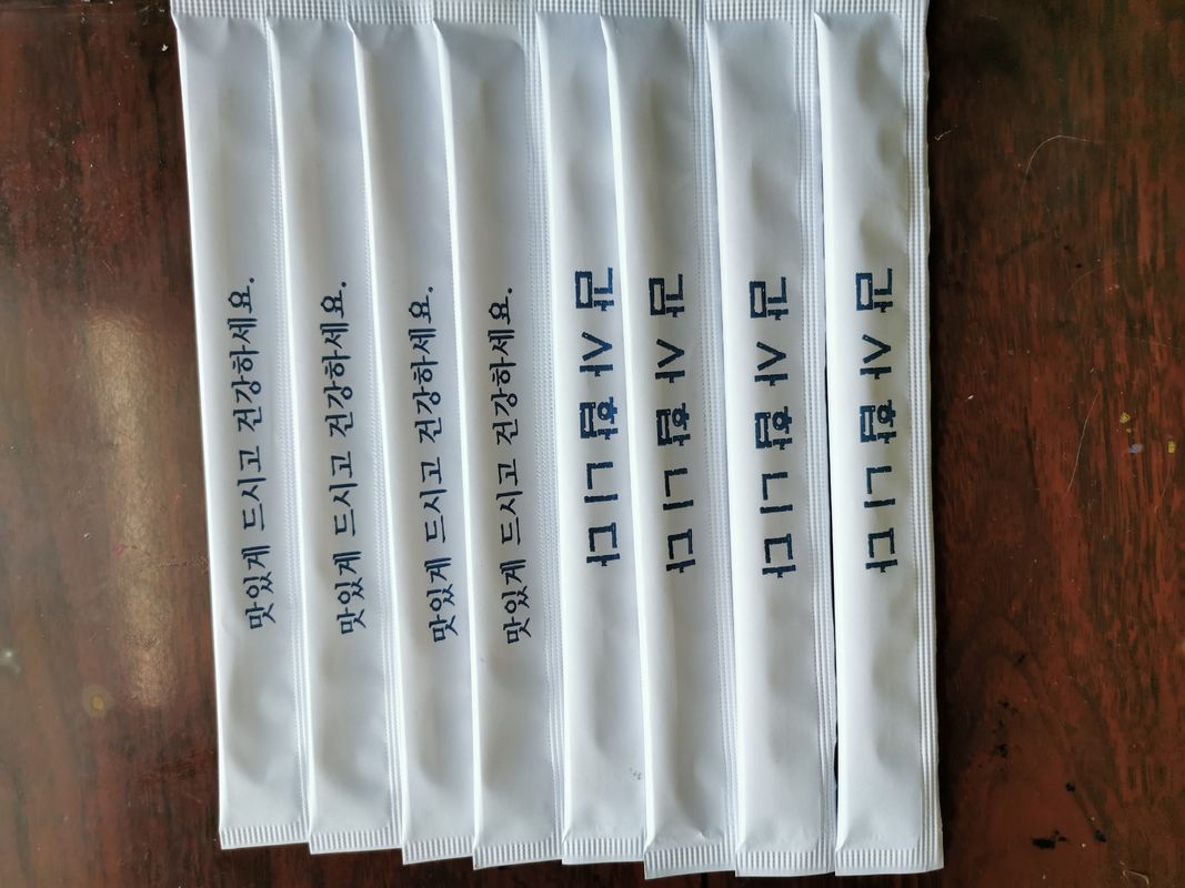 Hashis de bambu naturais do sushi amigável de Eco com pacote de papel